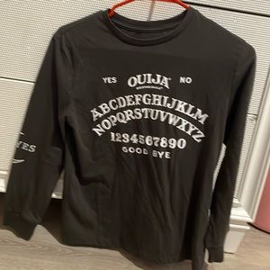 Long sleeved Ouija shirt with an a Ouija board on it pre-used but clean 7/8